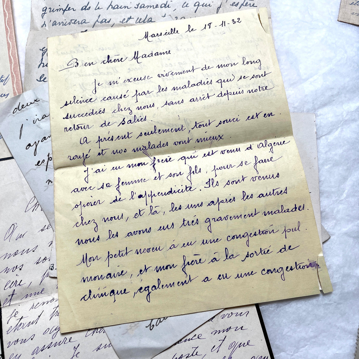Set of 10 vintage French handwritten letters from the 1930s, showing varied elegant script and paper.