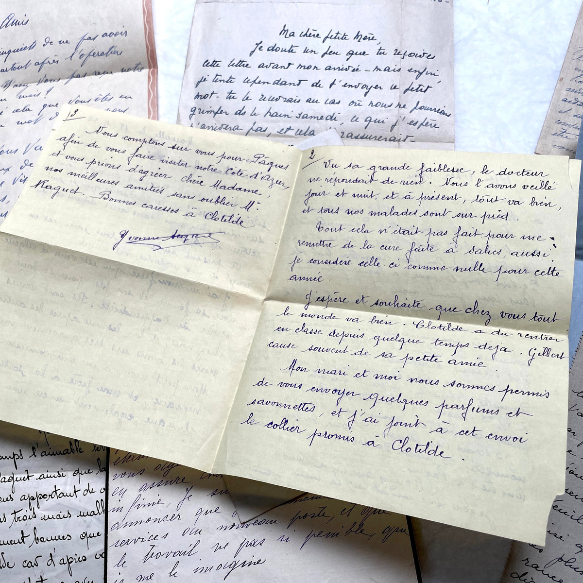 Set of 10 vintage French handwritten letters from the 1930s, showing varied elegant script and paper.