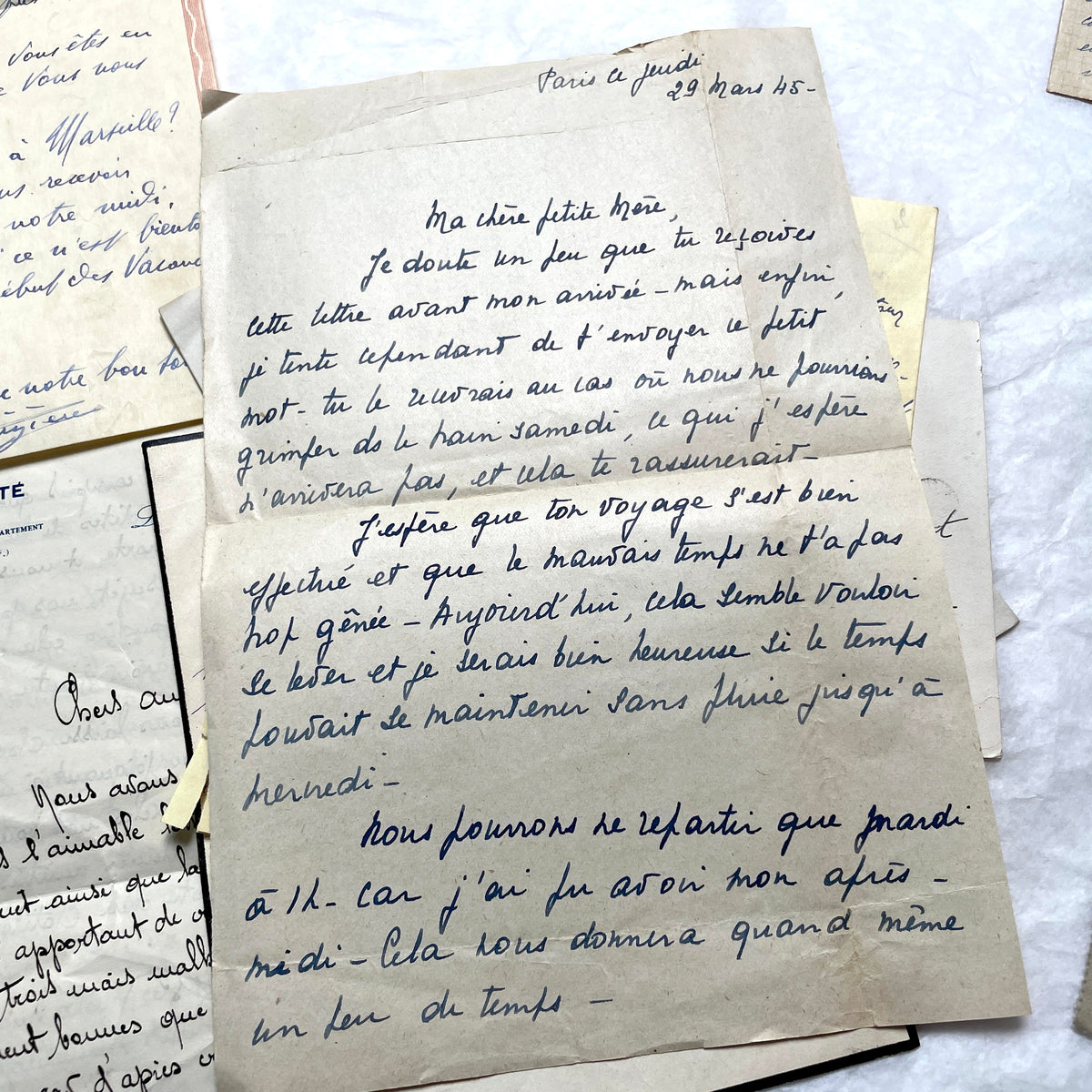 Set of 10 vintage French handwritten letters from the 1930s, showing varied elegant script and paper.