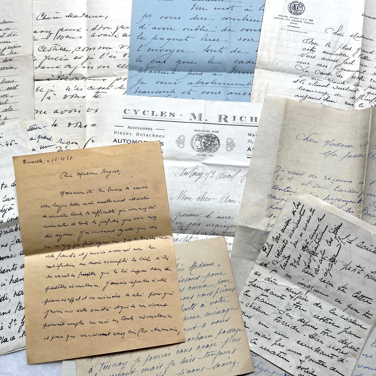 Set of 10 1930s vintage French letters with intricate handwritten script on antique paper, offering historical insight.