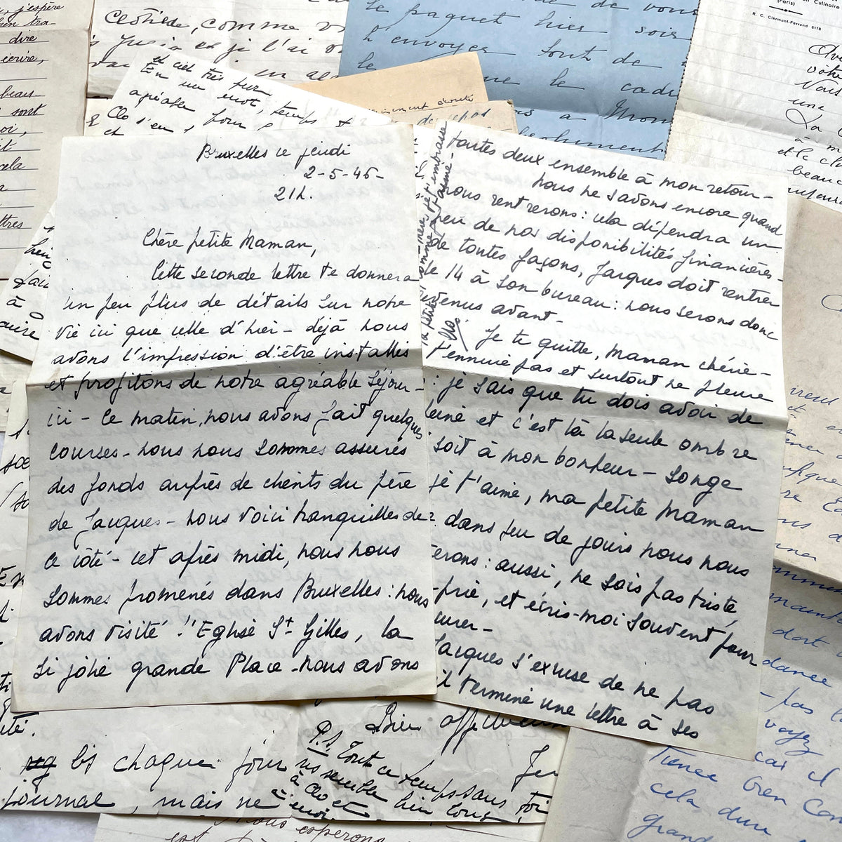 Set of 10 1930s vintage French letters with intricate handwritten script on antique paper, offering historical insight.