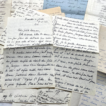 Set of 10 1930s vintage French letters with intricate handwritten script on antique paper, offering historical insight.