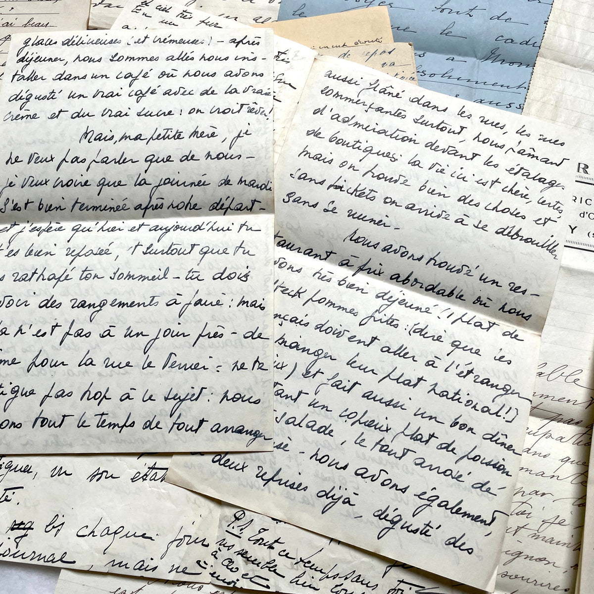Set of 10 1930s vintage French letters with intricate handwritten script on antique paper, offering historical insight.