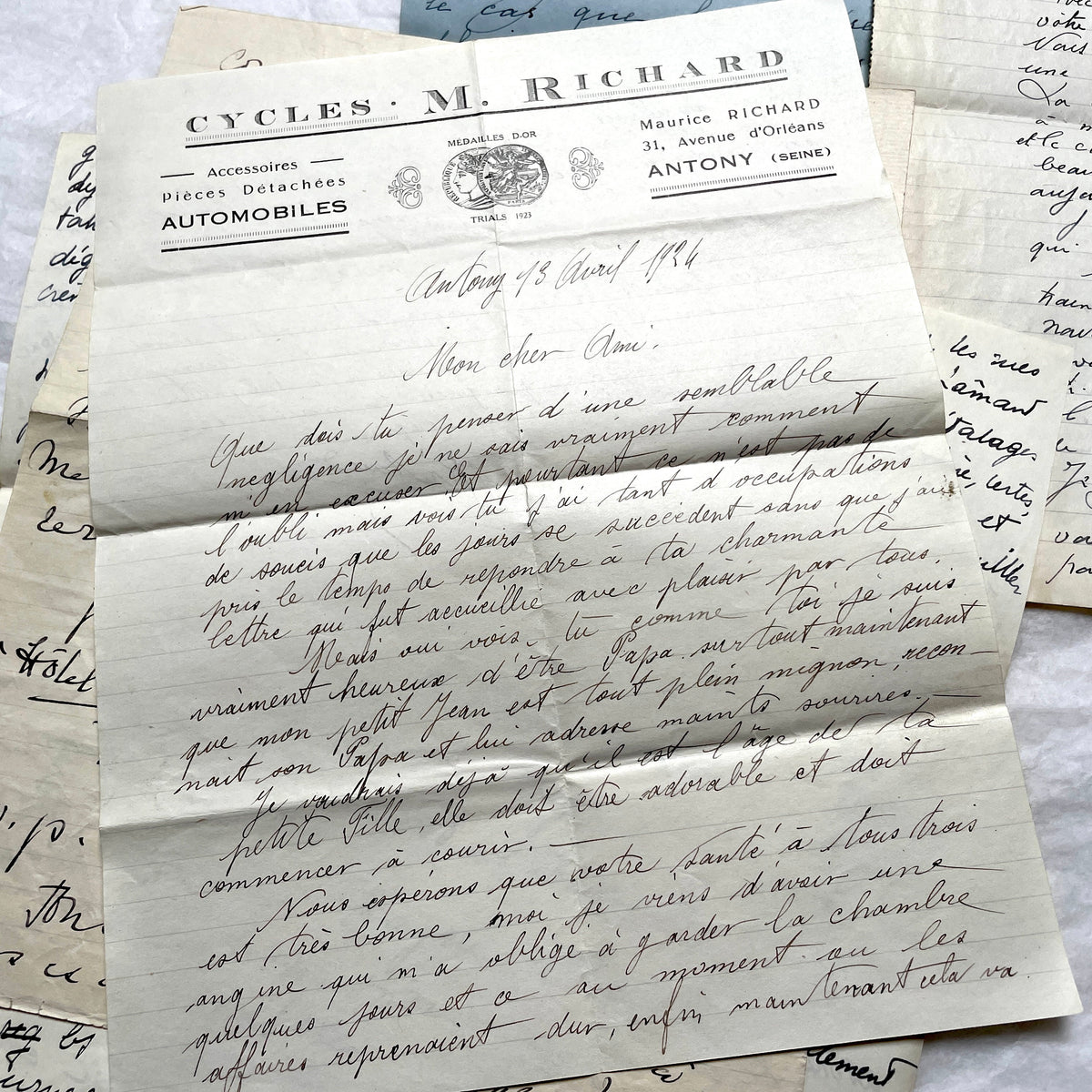 Set of 10 1930s vintage French letters with intricate handwritten script on antique paper, offering historical insight.