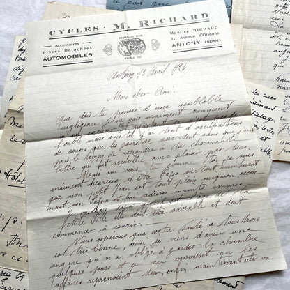 Set of 10 1930s vintage French letters with intricate handwritten script on antique paper, offering historical insight.