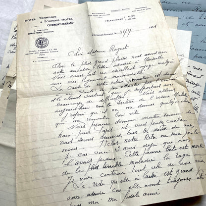 Set of 10 1930s vintage French letters with intricate handwritten script on antique paper, offering historical insight.