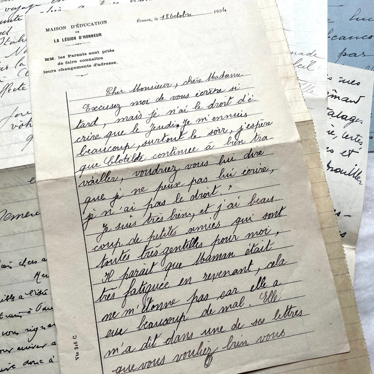 Set of 10 1930s vintage French letters with intricate handwritten script on antique paper, offering historical insight.