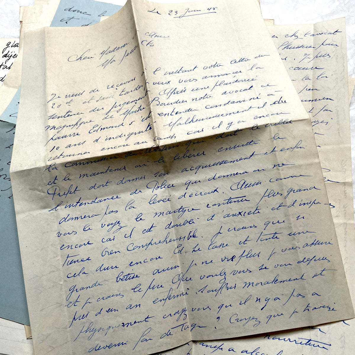 Set of 10 1930s vintage French letters with intricate handwritten script on antique paper, offering historical insight.