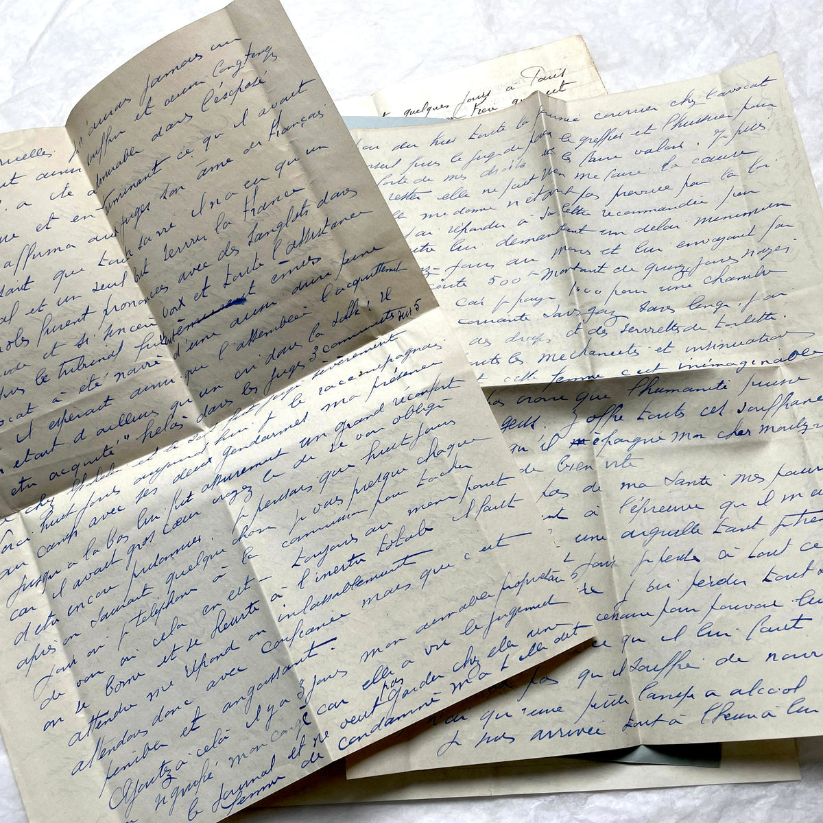 Set of 10 1930s vintage French letters with intricate handwritten script on antique paper, offering historical insight.