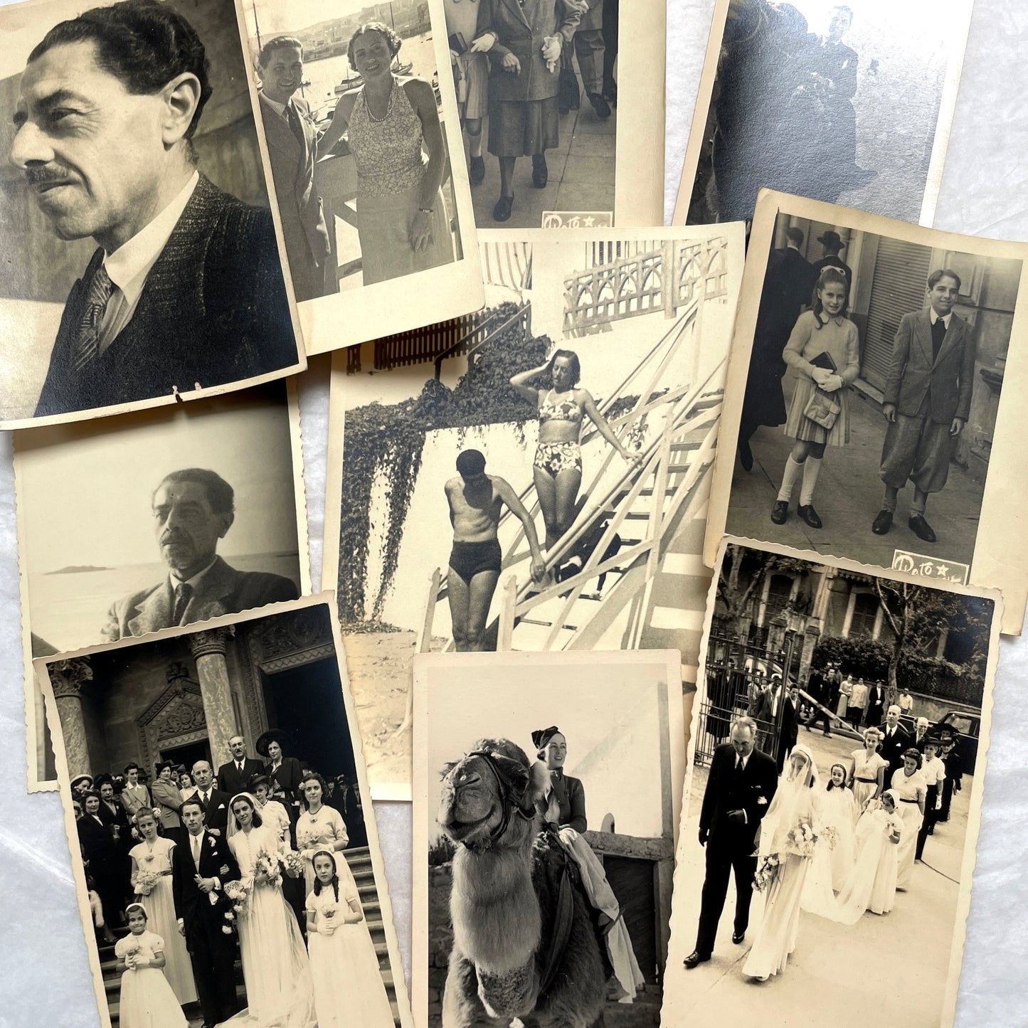 Lot of 1940s vintage photographs featuring family portraits, wedding scenes, beachgoers, and a person riding a camel.