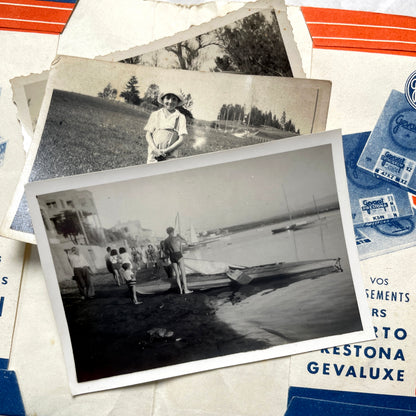 1930s vintage photographs lot showing European family life, children, classic cars, and travel scenes including a ship.