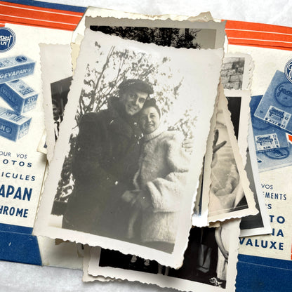 1930s vintage photographs lot showing European family life, children, classic cars, and travel scenes including a ship.