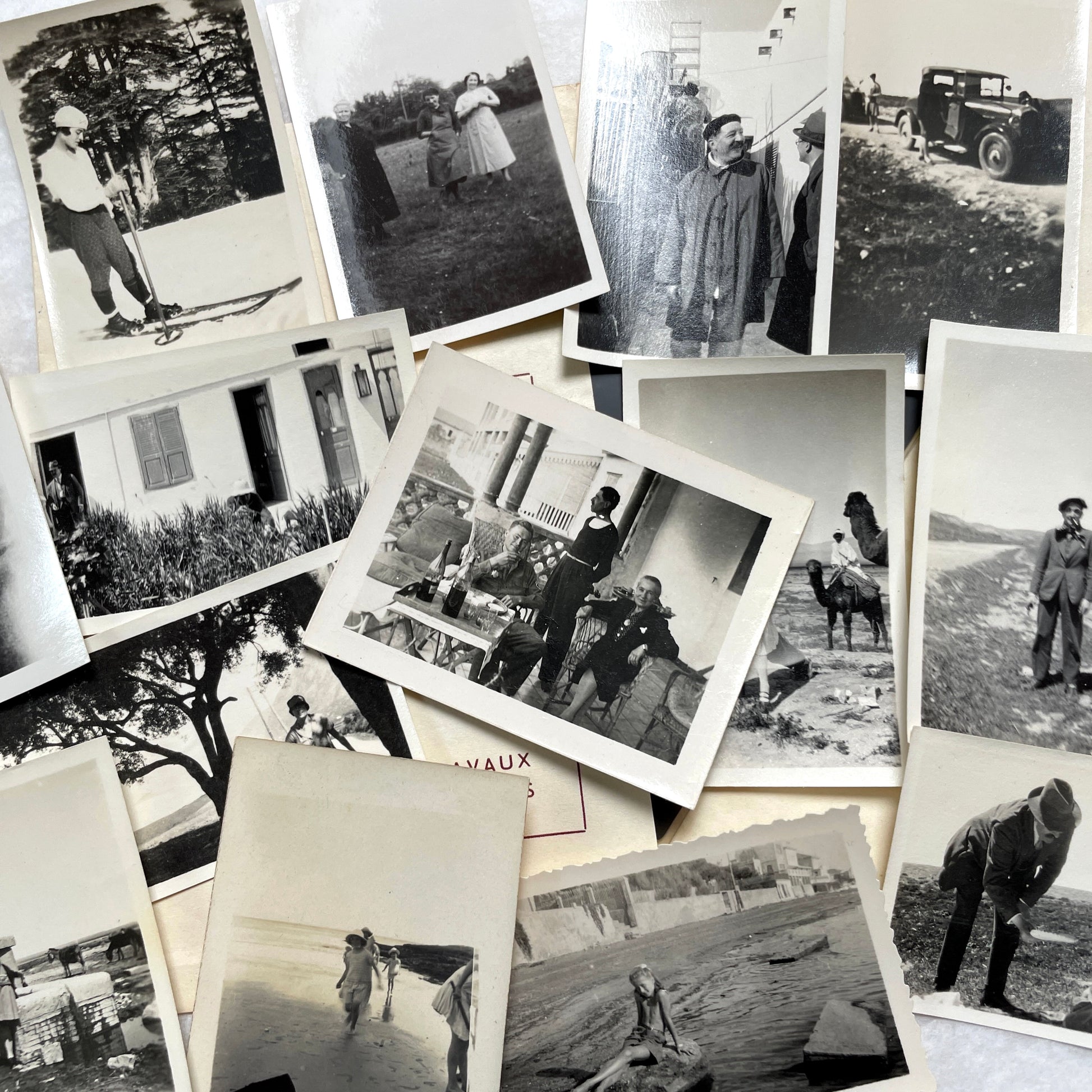 1930s vintage photograph lot showing French family life, travel, skiing, beach scenes, and a vintage car.