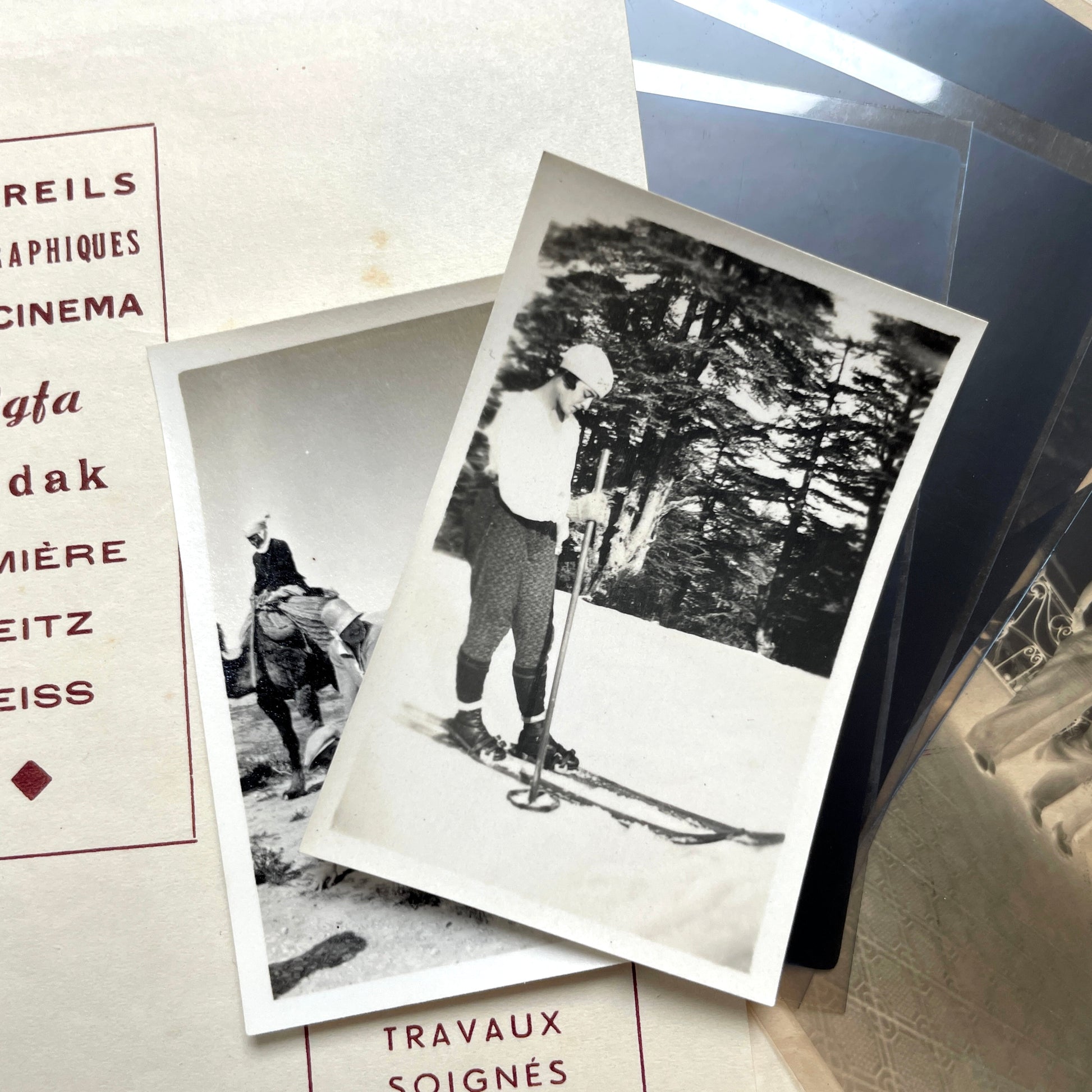 1930s vintage photograph lot showing French family life, travel, skiing, beach scenes, and a vintage car.