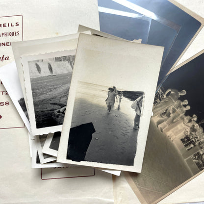 1930s vintage photograph lot showing French family life, travel, skiing, beach scenes, and a vintage car.
