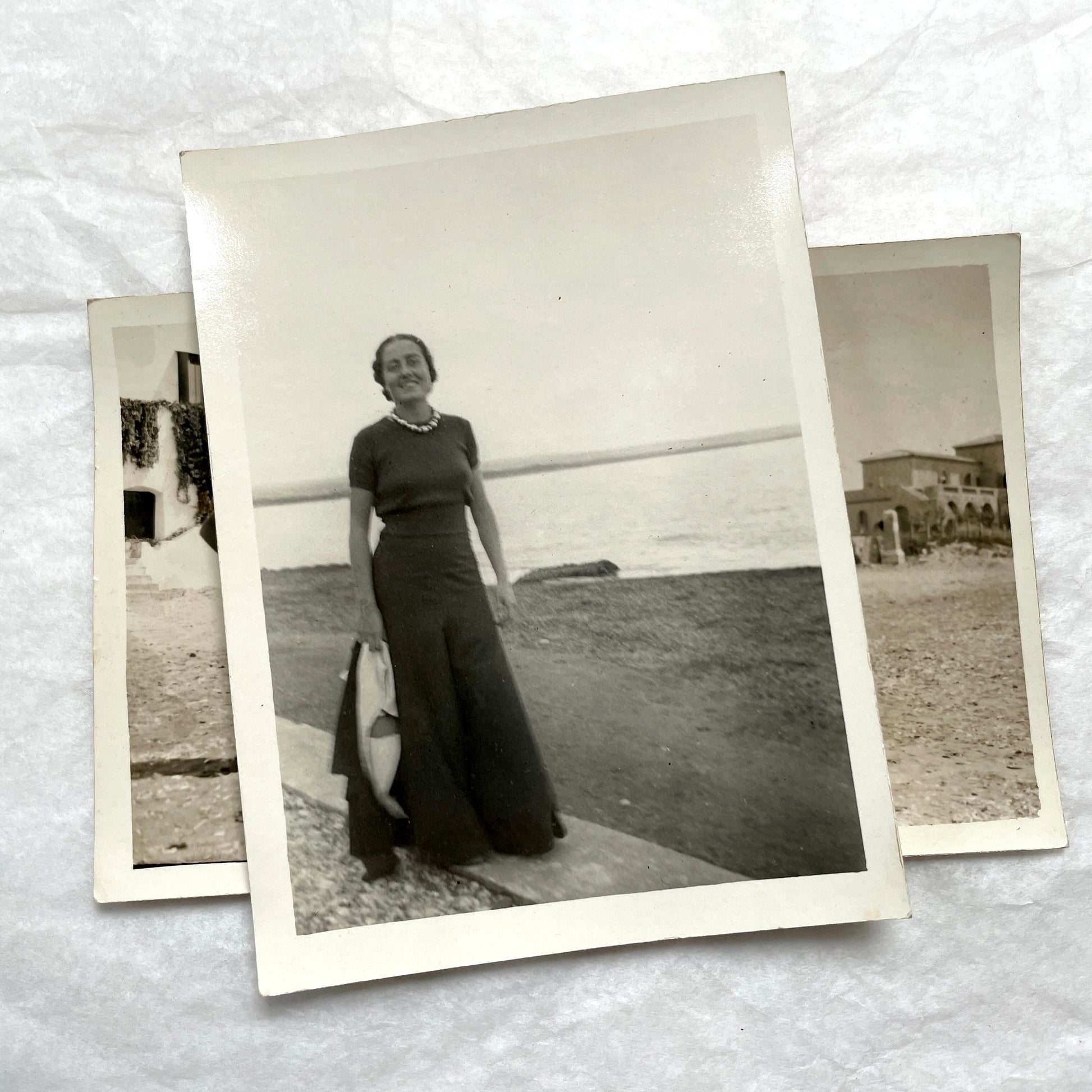 1950s French photograph lot - various black and white images of families, beach scenes, and street life in Algeria.