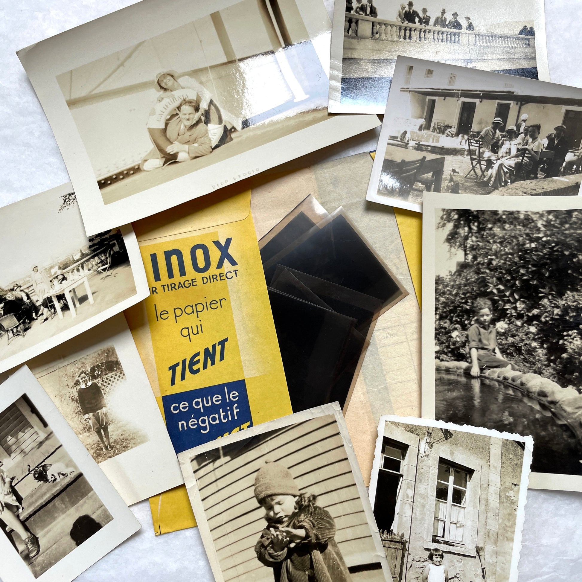 1930s vintage photo lot with French family scenes and original negatives, capturing nostalgic moments of daily life.