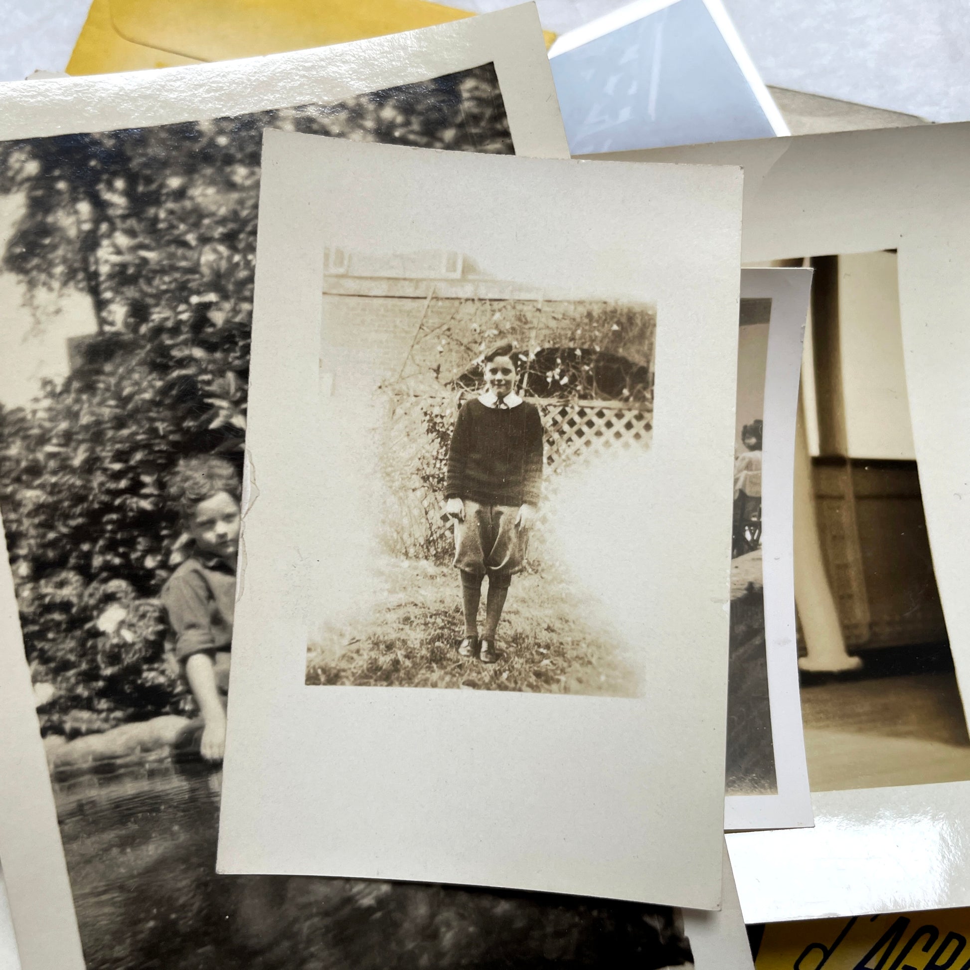 1930s vintage photo lot with French family scenes and original negatives, capturing nostalgic moments of daily life.
