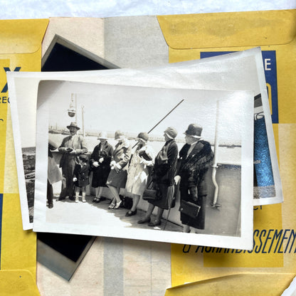 1920s vintage photograph lot showing people skiing in mountains, riding camels in the desert, and gathered on a ship deck.