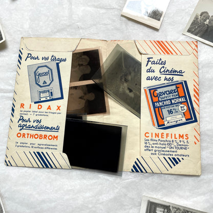 1930s French vintage photographs lot with Gevaert film and paper ephemera, showing everyday life and advertisements.