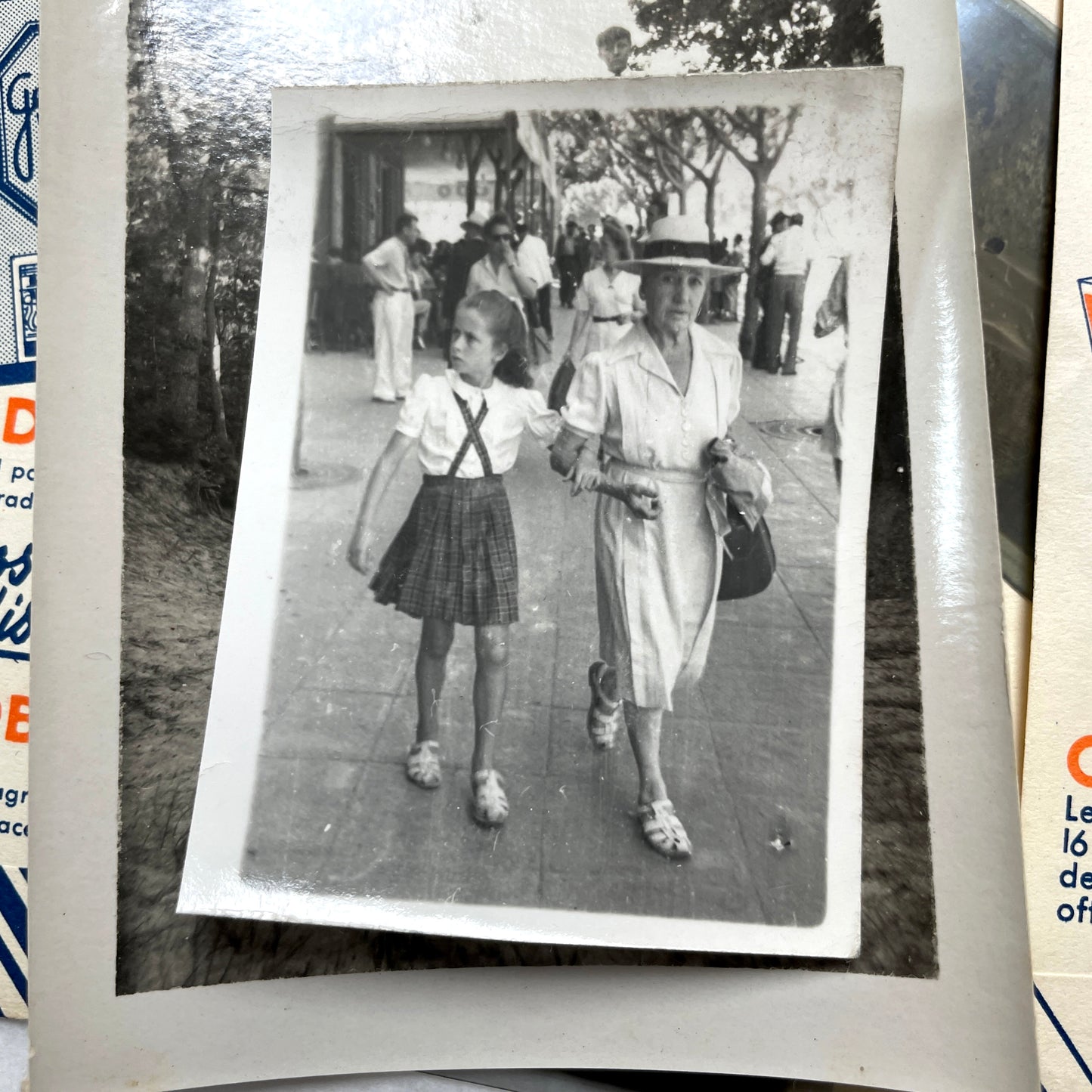 1930s French vintage photographs lot with Gevaert film and paper ephemera, showing everyday life and advertisements.