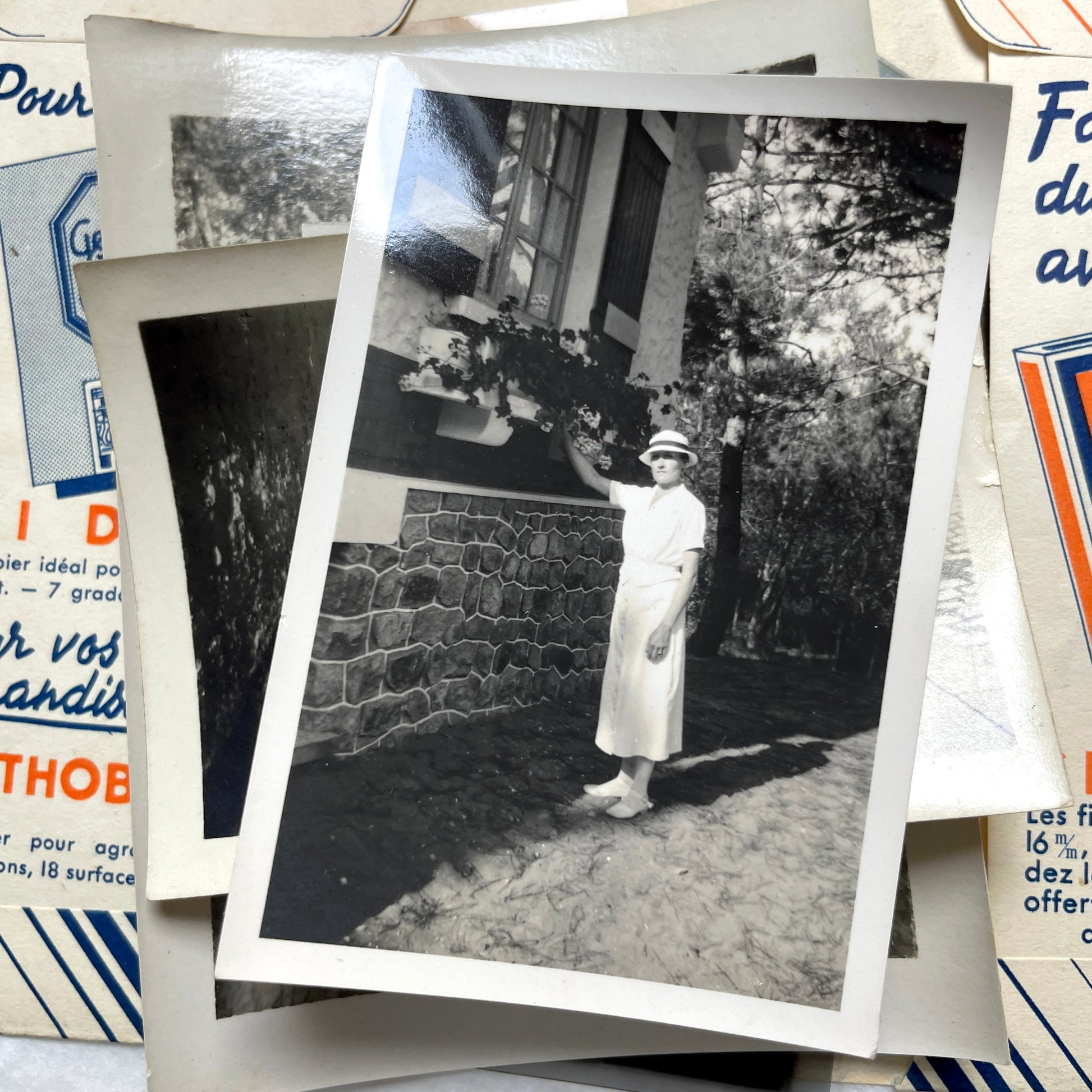 1930s French vintage photographs lot with Gevaert film and paper ephemera, showing everyday life and advertisements.