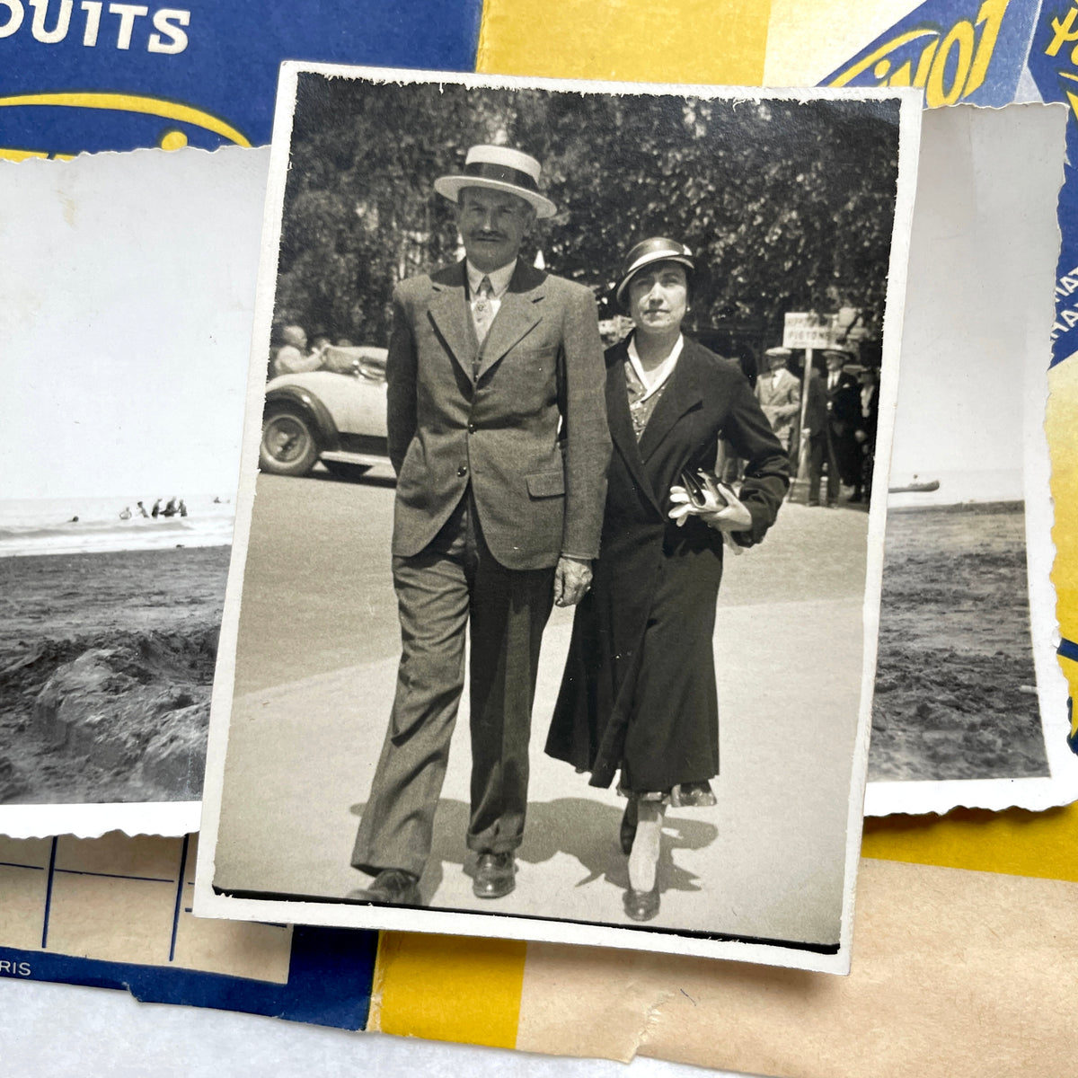 1930s vintage French photo lot with black and white pictures of family, children on the beach, and elegant couples.