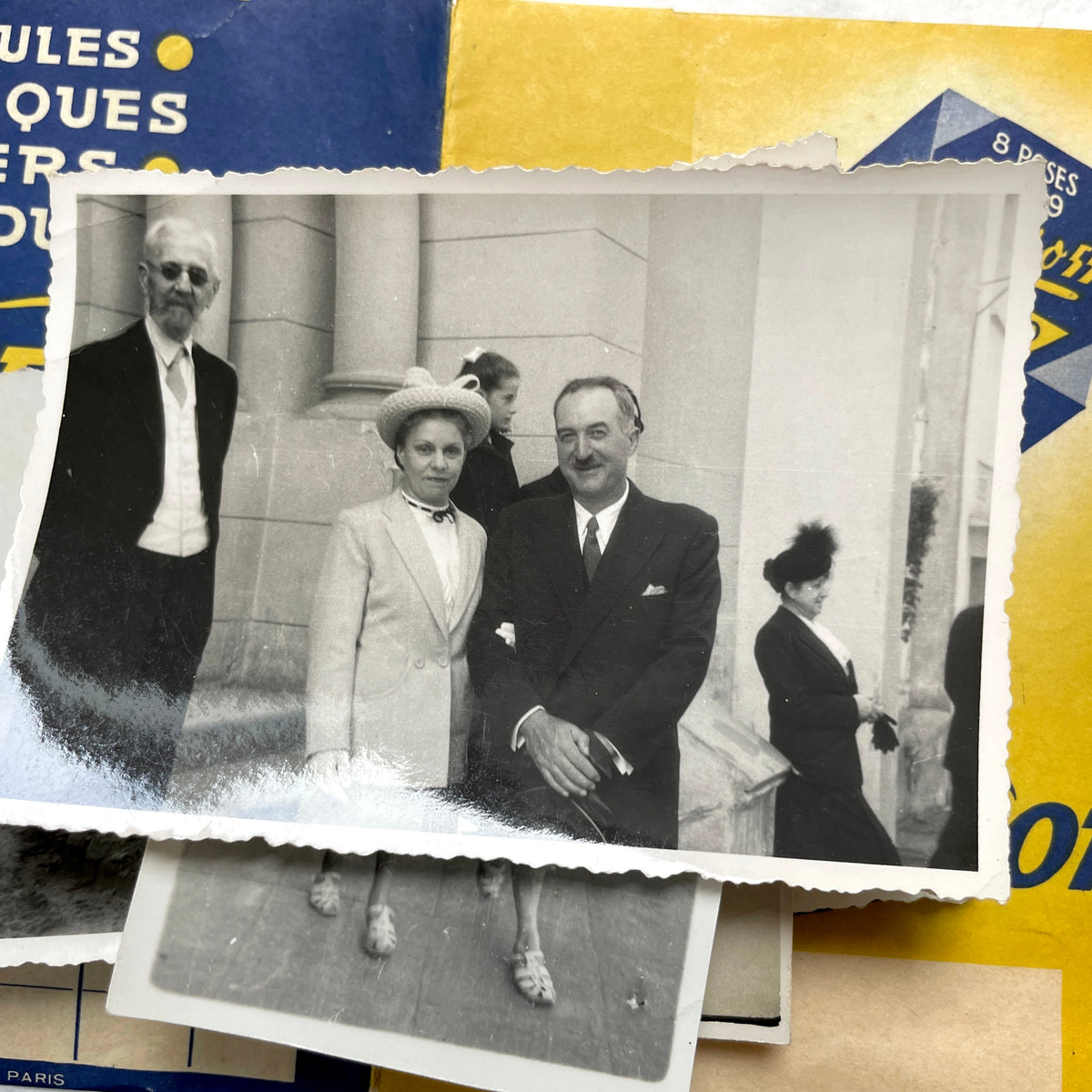 1930s vintage French photo lot with black and white pictures of family, children on the beach, and elegant couples.