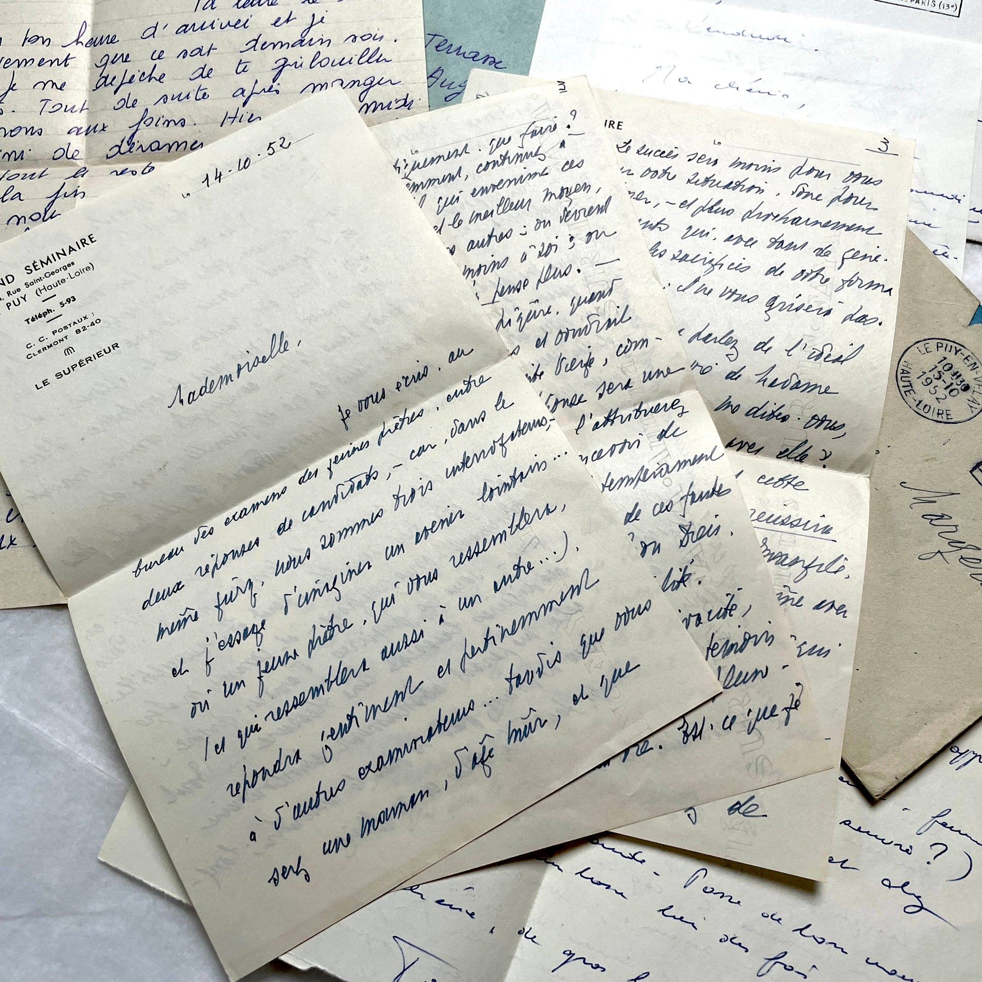 Set of 5 1950s French handwritten letters with envelopes and vintage stamps, showing personal correspondence.