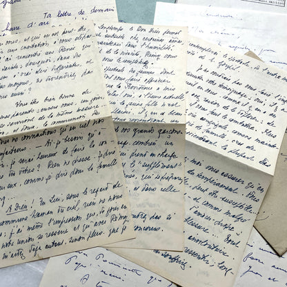 Set of 5 1950s French handwritten letters with envelopes and vintage stamps, showing personal correspondence.