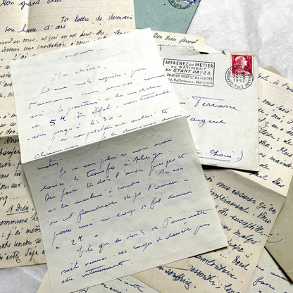 Set of 5 1950s French handwritten letters with envelopes and vintage stamps, showing personal correspondence.