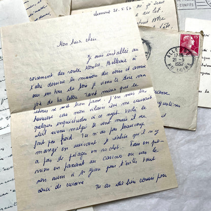 1950s French handwritten letters and envelopes set. Vintage correspondence with stamps and postmarks.
