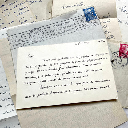 1950s French handwritten letters and envelopes set. Vintage correspondence with stamps and postmarks.