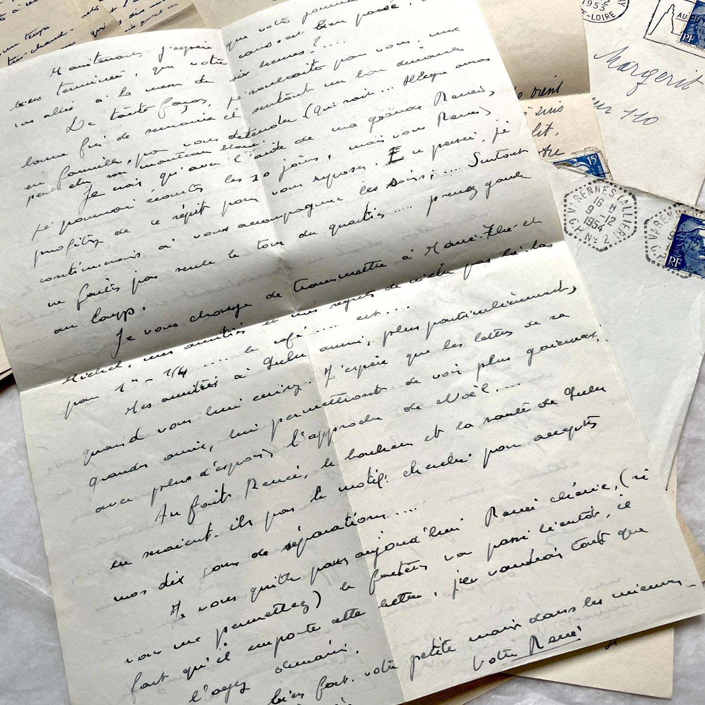 1950s French handwritten letters and envelopes set. Vintage correspondence with stamps and postmarks.