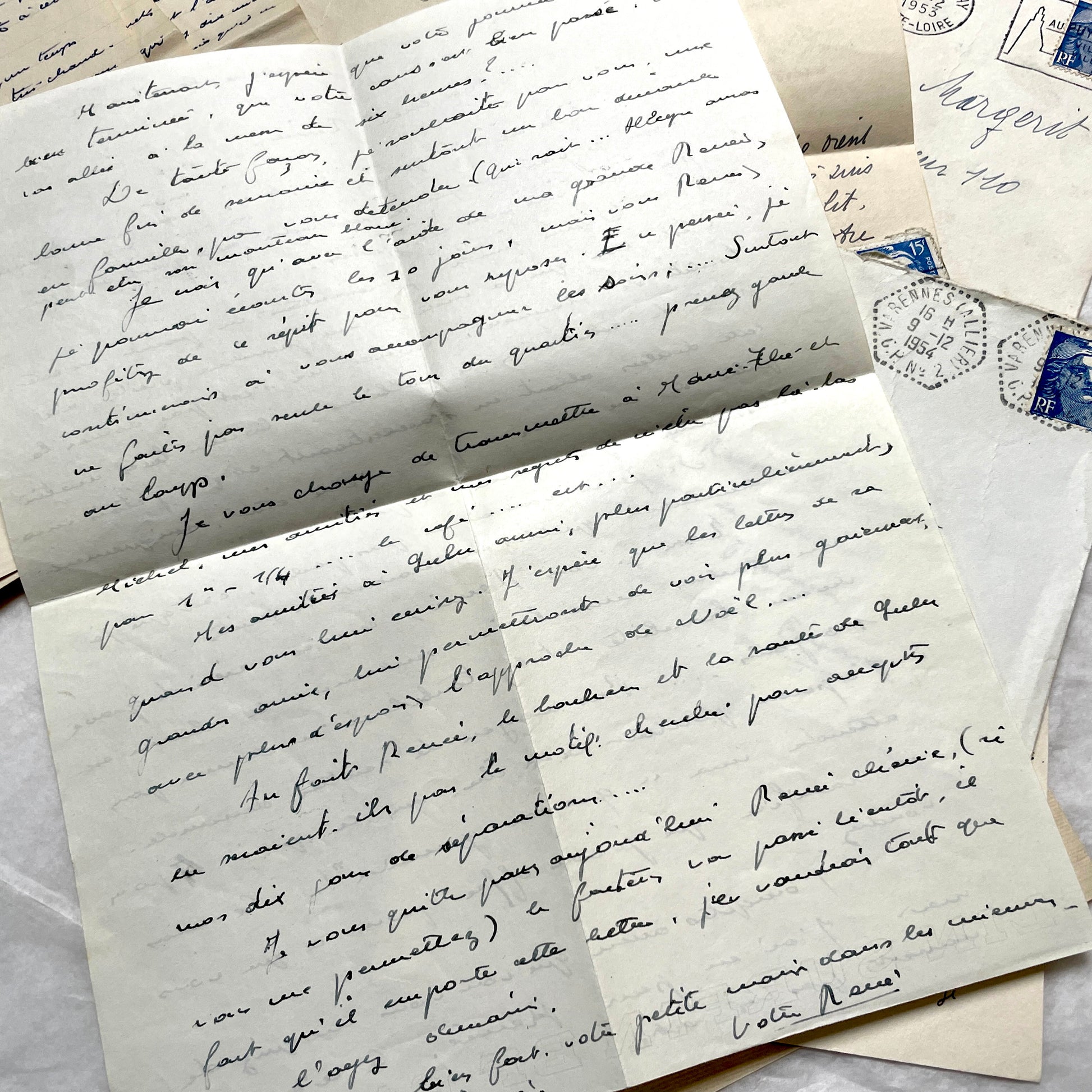 1950s French handwritten letters and envelopes set. Vintage correspondence with stamps and postmarks.
