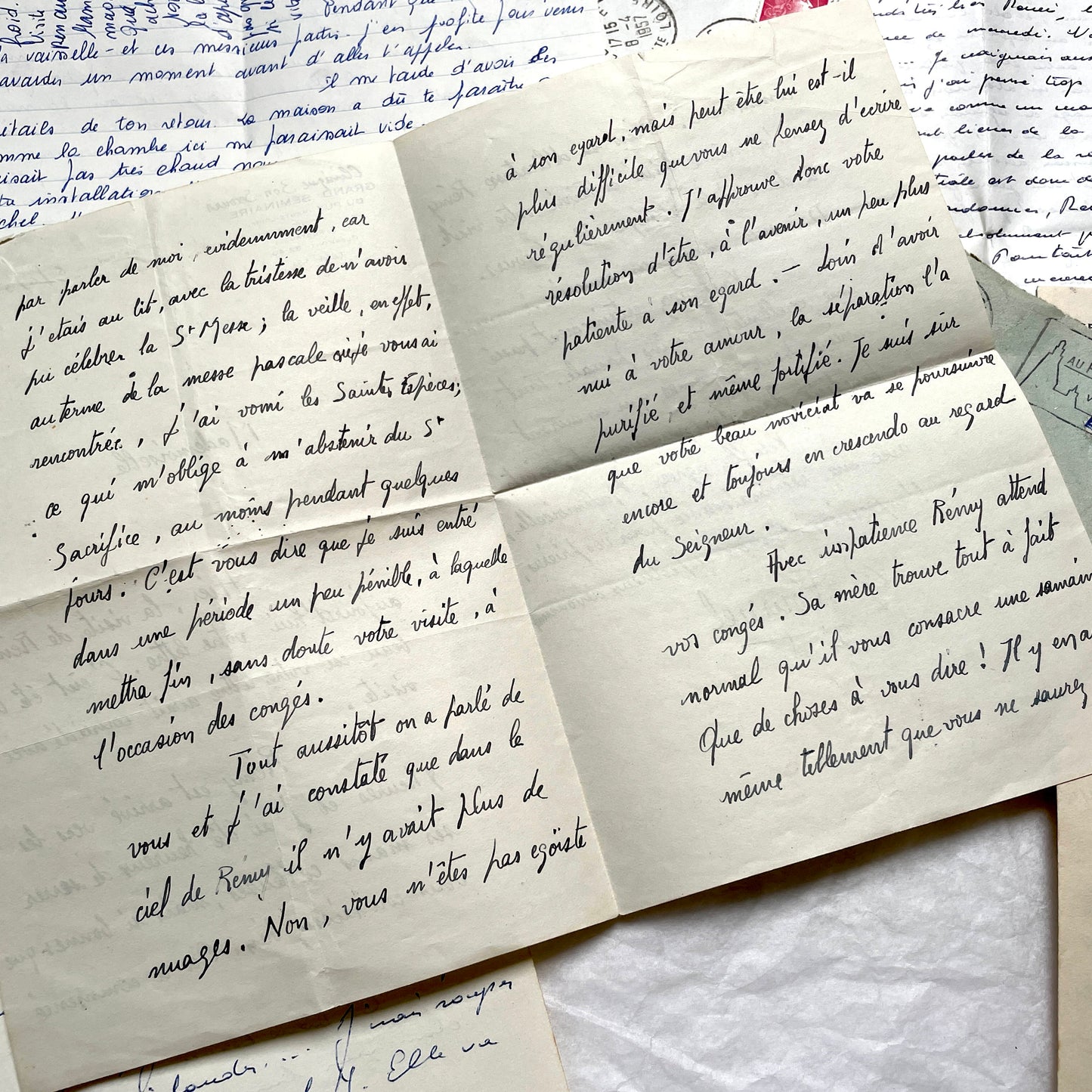 Set of 5 1950s French letters with envelopes, featuring handwritten script, vintage stamps, and postmarks.