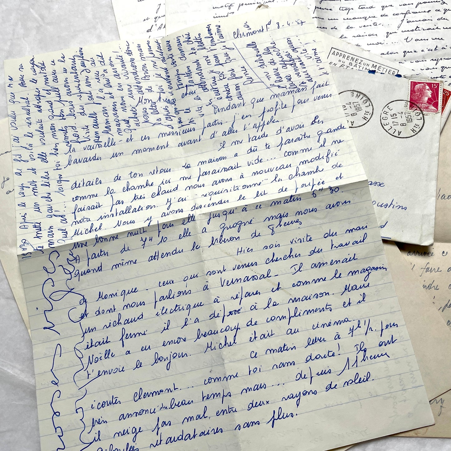 Set of 5 1950s French letters with envelopes, featuring handwritten script, vintage stamps, and postmarks.