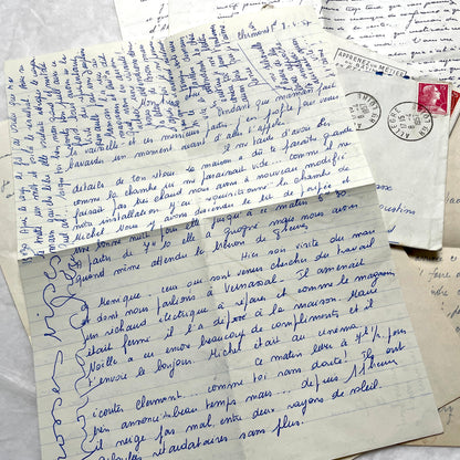 Set of 5 1950s French letters with envelopes, featuring handwritten script, vintage stamps, and postmarks.