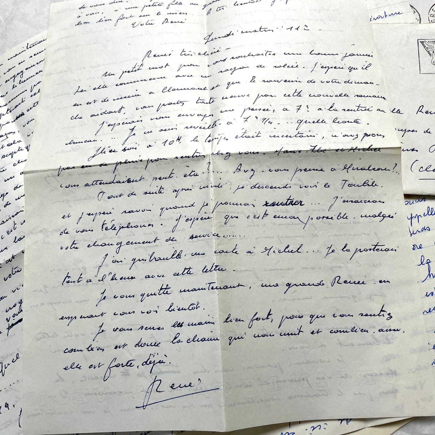 Set of 5 1950s French letters with envelopes, featuring handwritten script, vintage stamps, and postmarks.