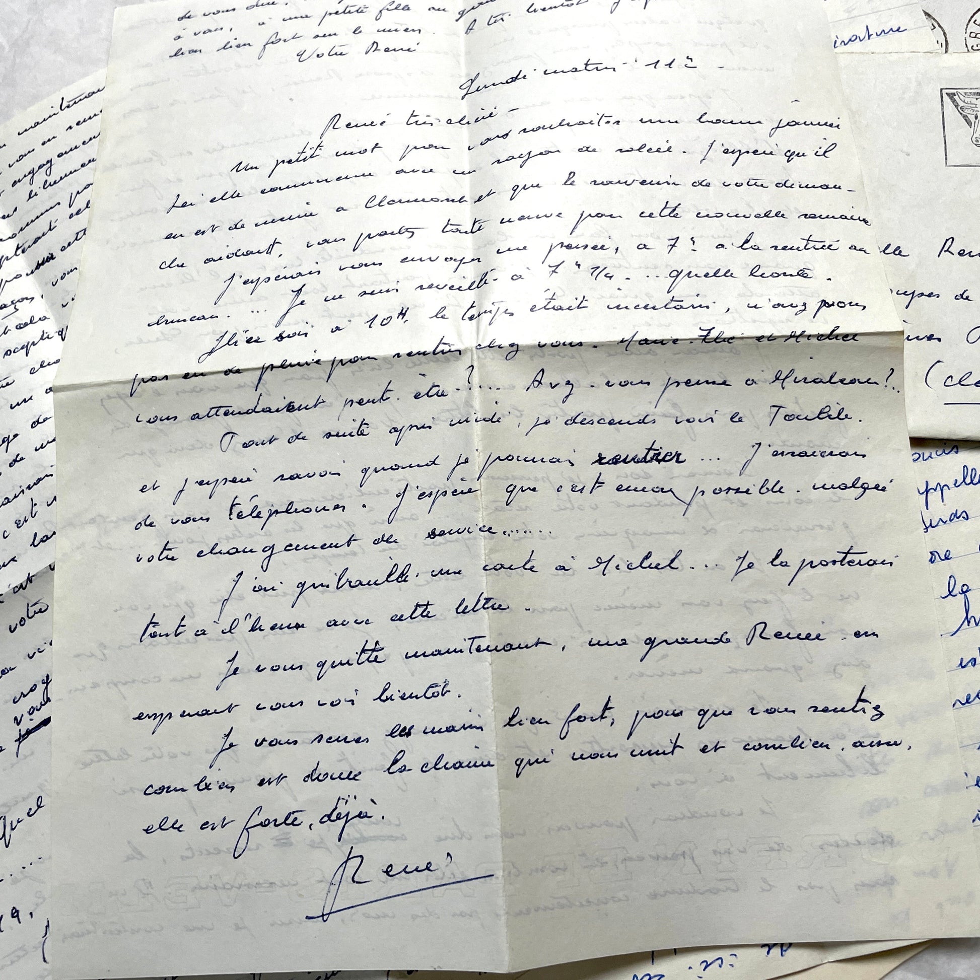Set of 5 1950s French letters with envelopes, featuring handwritten script, vintage stamps, and postmarks.