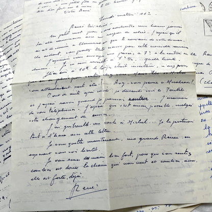Set of 5 1950s French letters with envelopes, featuring handwritten script, vintage stamps, and postmarks.