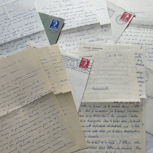 A set of 1950s French letters and envelopes with handwritten text, original stamps, and various postmarks from France.