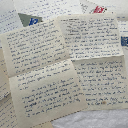 A set of 1950s French letters and envelopes with handwritten text, original stamps, and various postmarks from France.