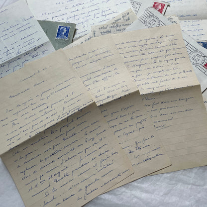 A set of 1950s French letters and envelopes with handwritten text, original stamps, and various postmarks from France.