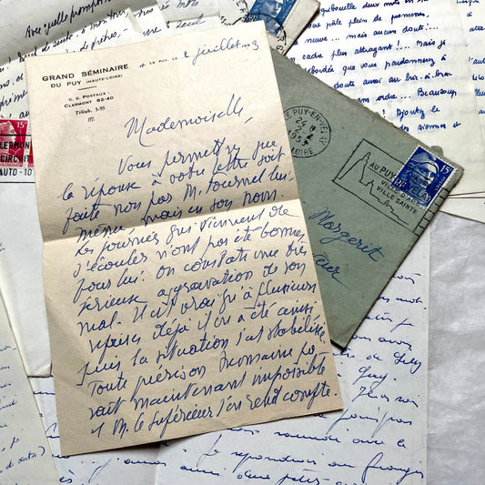 Set of 5 1950s French handwritten letters with envelopes, visible postage stamps and cursive text in French.