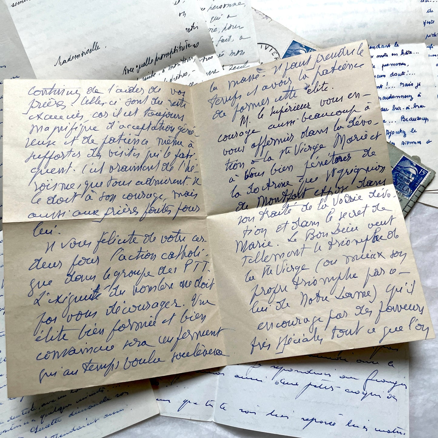 Set of 5 1950s French handwritten letters with envelopes, visible postage stamps and cursive text in French.