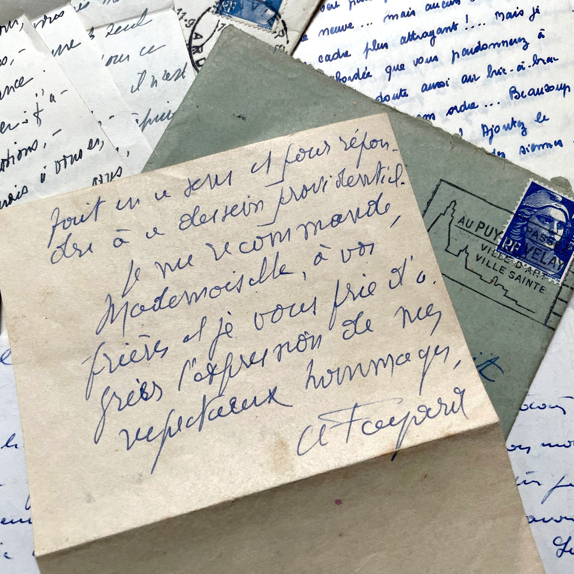 Set of 5 1950s French handwritten letters with envelopes, visible postage stamps and cursive text in French.