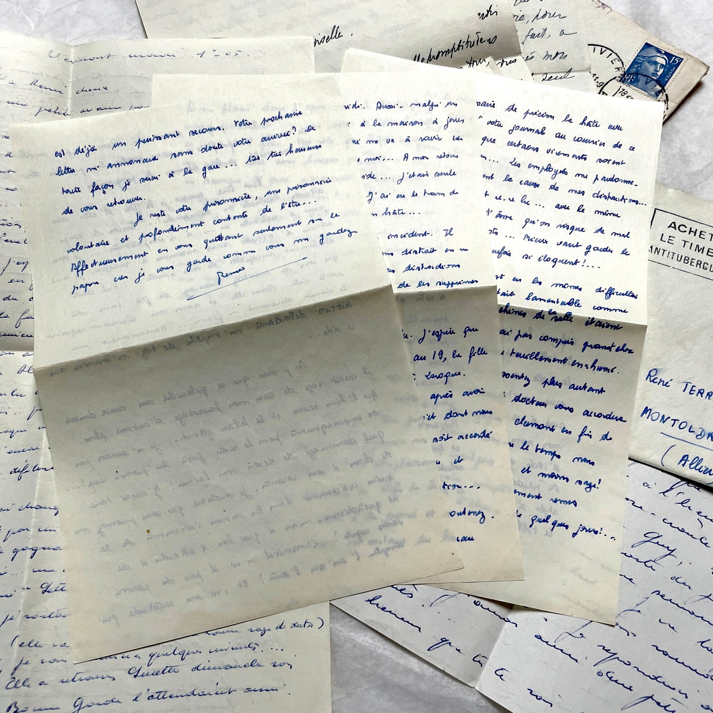 Set of 5 1950s French handwritten letters with envelopes, visible postage stamps and cursive text in French.
