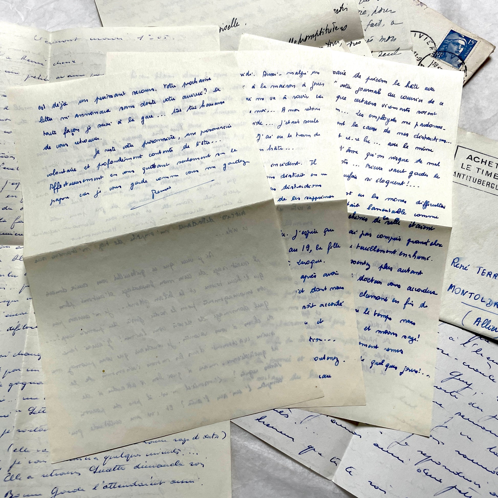 Set of 5 1950s French handwritten letters with envelopes, visible postage stamps and cursive text in French.