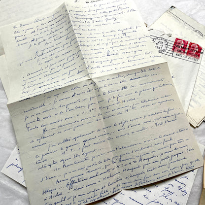 Set of 5 1950s French handwritten letters with envelopes, visible postage stamps and cursive text in French.